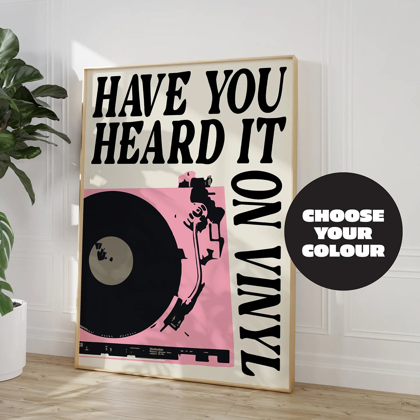 Retro music wall art featuring bold typography with the phrase "Have You Heard It on Vinyl?" and a vinyl record player illustration. Available in pink, green, and blue colours, perfect for vintage-inspired home decor.
