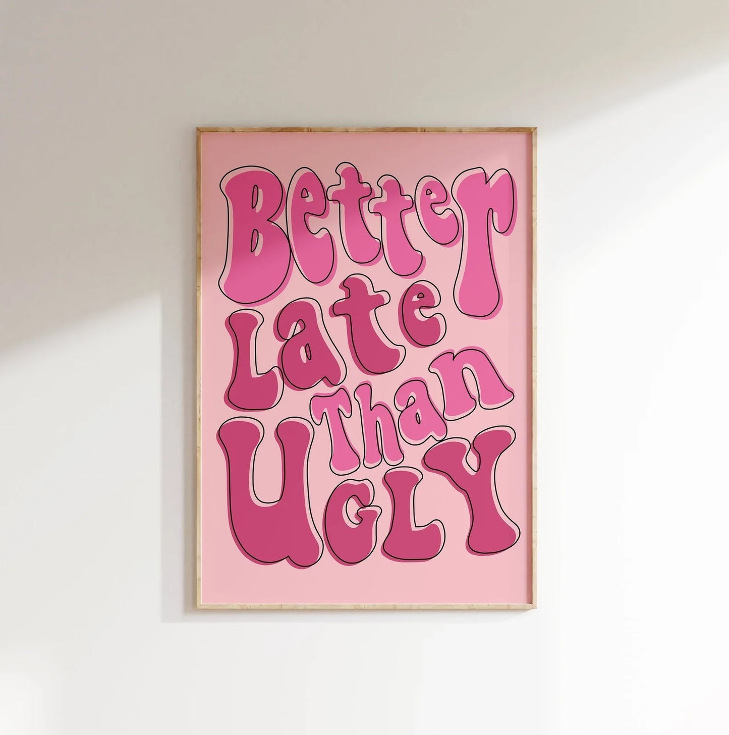 Better Late Than Ugly pink wall art with retro typography, perfect for dressing room or bathroom decor.