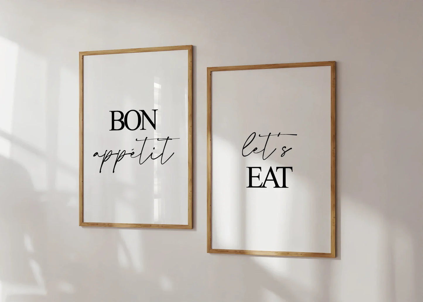 Bon Appétit Let’s Eat print set featuring minimalist black and white typography, perfect for modern kitchen and dining room wall art, available in A5, A4, and A3 sizes.