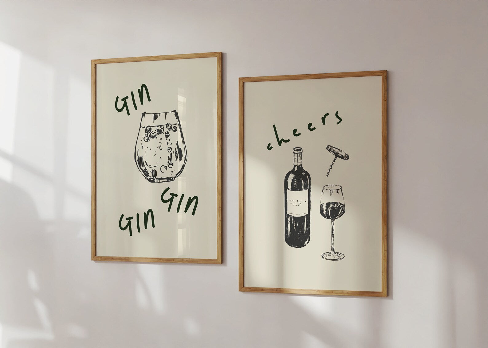 Gin & Wine Kitchen Print Set featuring retro-inspired illustrations of a gin glass and wine bottle with whimsical typography, perfect for kitchen, dining room, or home bar decor. Available in A5, A4, and A3 sizes.